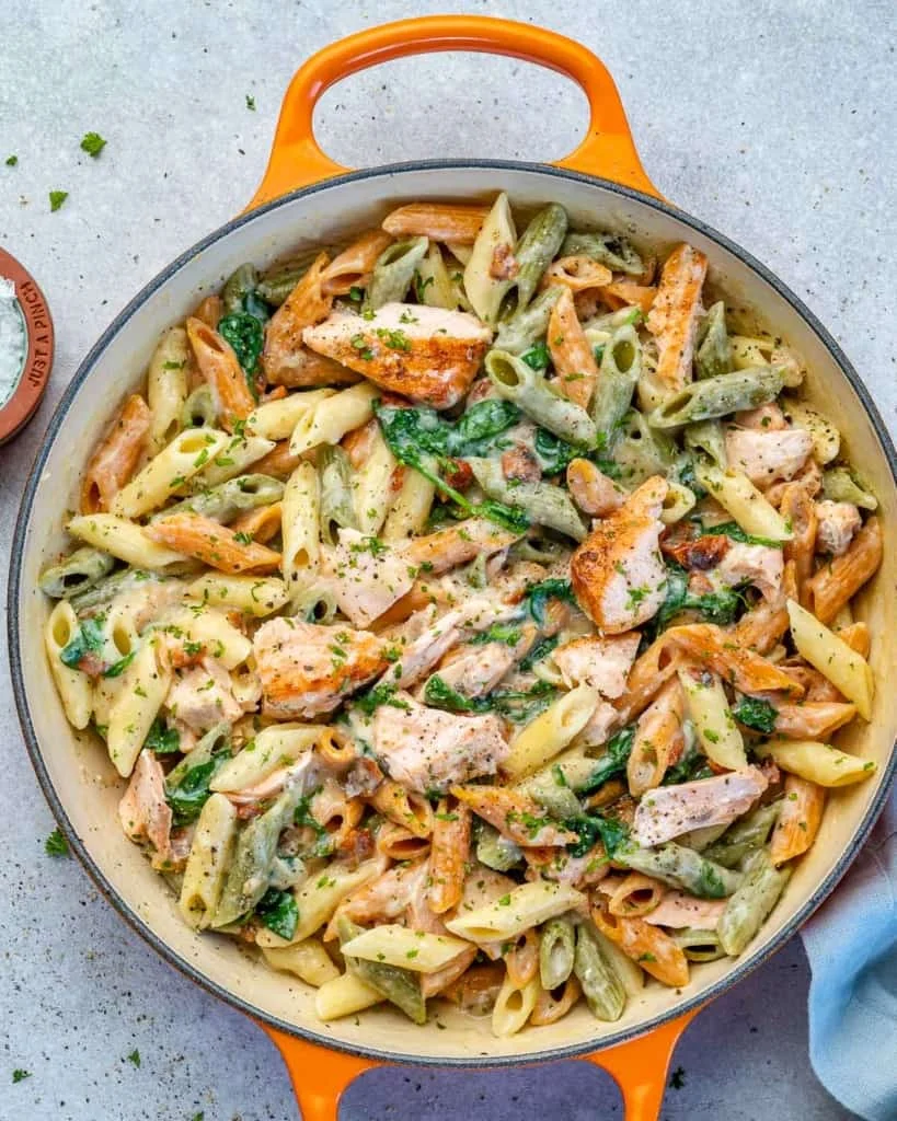 Creamy salmon pasta in a skillet