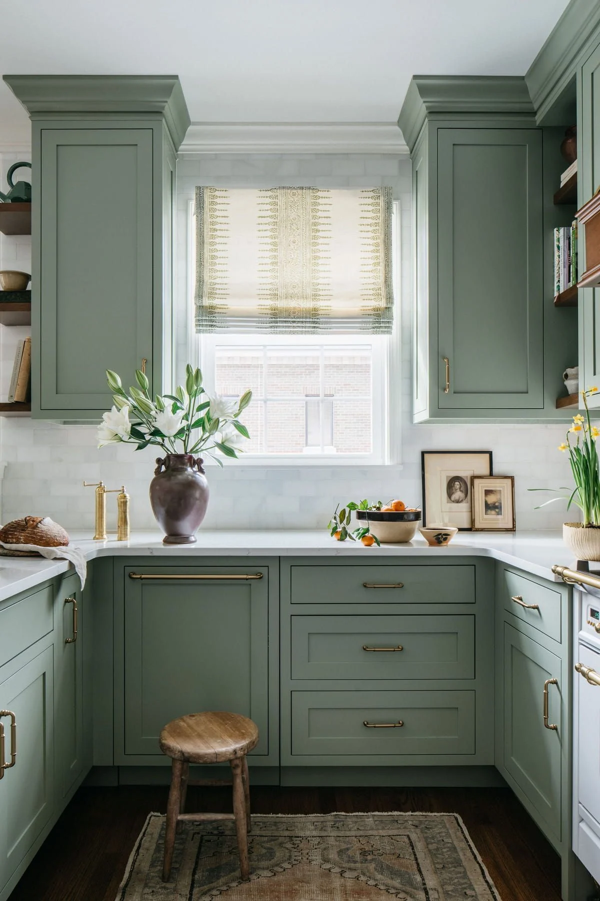 Elegant sage green kitchen design