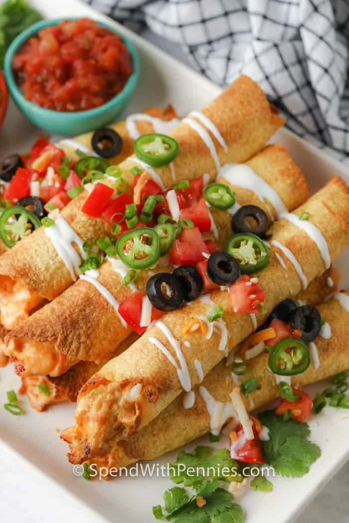 Crispy air fryer taquitos on a plate